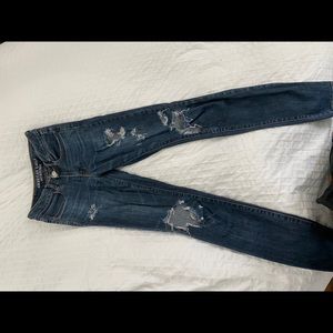 Skinny dark blue jeans